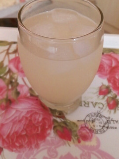 A picture of Grape and lemon juice on the rocks!.
