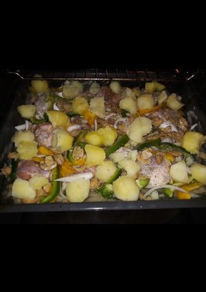 Una foto de Pollo con Porción al horno