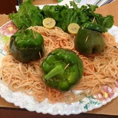 A picture of Stuffed capsicum with noodles.