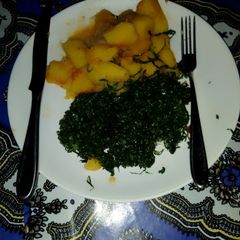 A picture of A recipe of bananas with sukuma wiki.