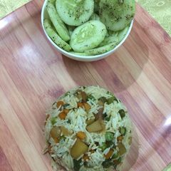 A picture of Veggie rice with pepper cucumber.