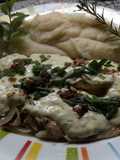 Filet de merluza con crema al roquefort