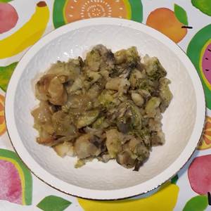 Patata, alcachofa y cebolla al horno con majada de ajo y perejil