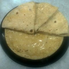 A picture of Phulka roti with kasuri methi.