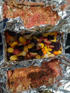 A picture of Meatloaf with Carrots and Potato's.