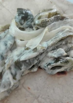 Una foto de Rajas con crema
