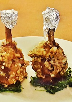 Foto principal de Pollo en Tempura de Almendra y Pistacho con Rúcula frita