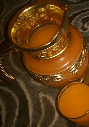 A picture of Carrot and passion juice #author marathon.