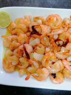 Una foto de Camarones al pil pil