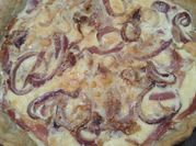 Una foto de pastel de jamón serrano