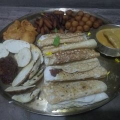 A picture of Poush pitha thali.