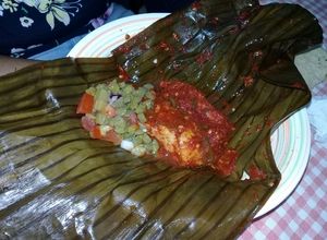 Una foto de Envuelto de pollo en hoja de plátano