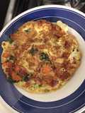 Tortilla de coliflor espinaca zanahoria tomate jamón y queso