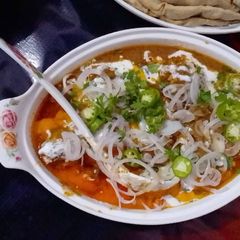 A picture of Dahi Dhuwan Gosht.