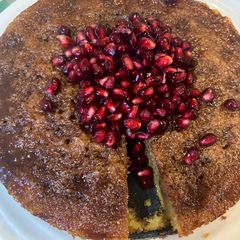 A picture of Orange and pomegranate cake.