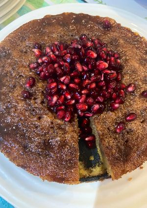 A picture of Orange and pomegranate cake.