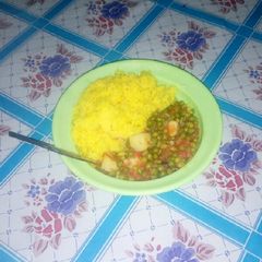 Tumeric Rice and peas stew A picture of Tumeric Rice and peas stew.