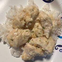 A picture of Parmesan Chicken Casserole over rice.