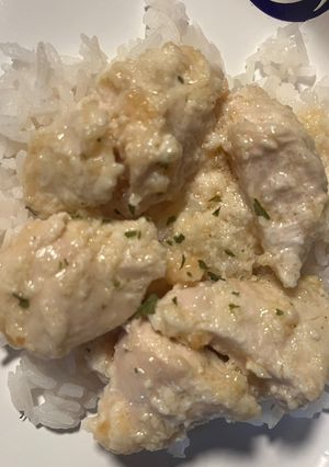 A picture of Parmesan Chicken Casserole over rice.