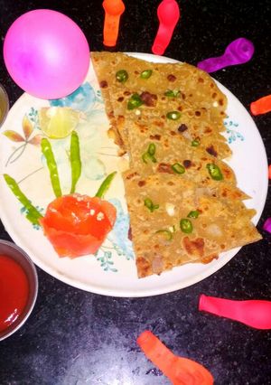 A picture of Poppy seeds and dessicated coconut paratha.