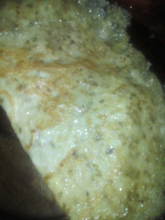 Una foto de Omelette con cebolla, tomate y queso