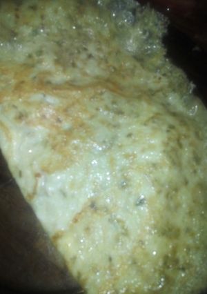 Una foto de Omelette con cebolla, tomate y queso