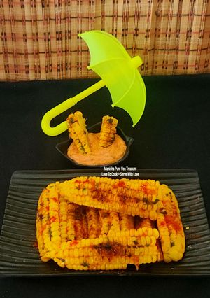 A picture of Butter Garlicky Spicy Grilled Crispy Curly Corn Ribs - With Schezwan Dip Corn Ribs Monsoon Munching.