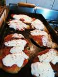 Milanesas napolitanas a la chapa
