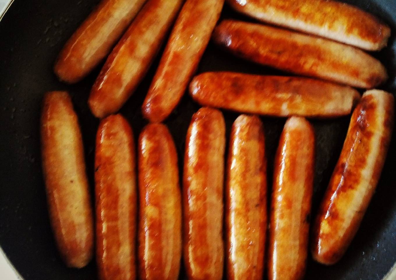 Shallow fried sausages