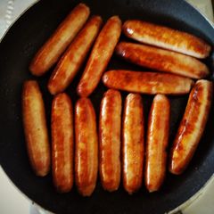 A picture of Shallow fried sausages.