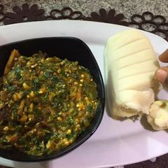 A picture of Okro soup with pounded yam.