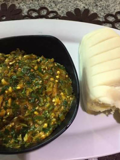 A picture of Okro soup with pounded yam.