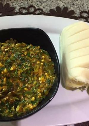 A picture of Okro soup with pounded yam.