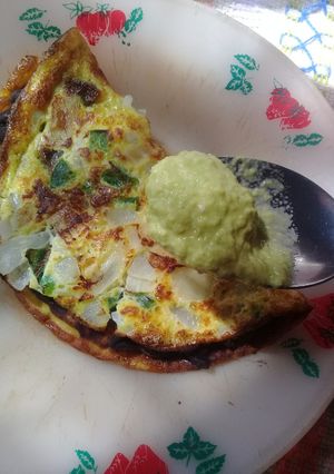 Una foto de Quesadilla de huevo revuelto relleno de frijoles