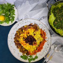 A picture of Persian Carrot Rice with Meatballs.