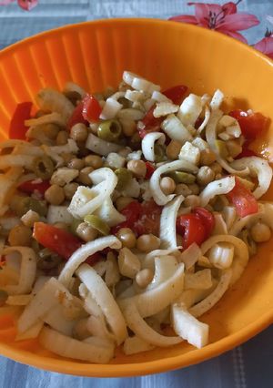 A picture of Chickpea Salad with Tomatoes, Olives, Parmesan, and Fennel.