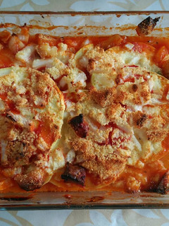 Una foto de Moussaka de patata, calabacín y lomo adobado