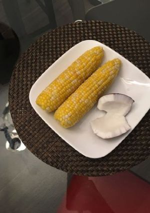 A picture of Boiled Yellow corn with coconut.