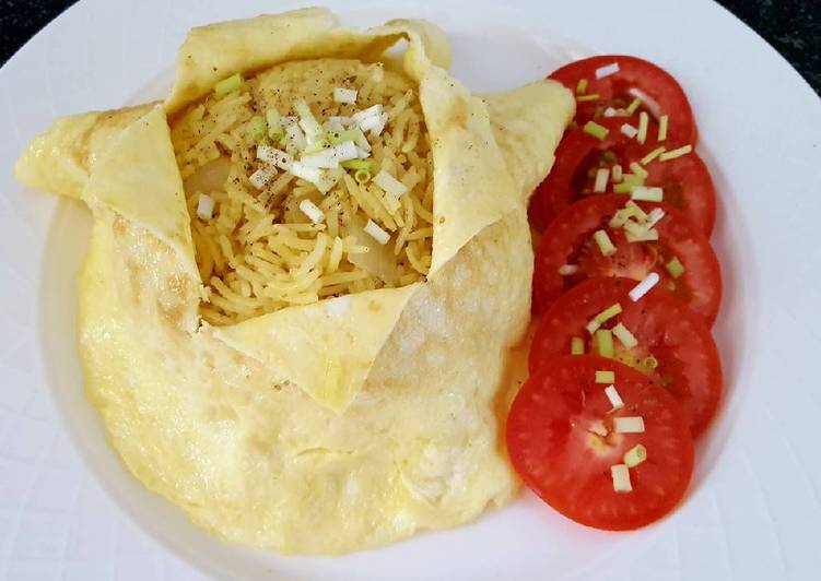 Onion turmeric pulao wrapped in egg