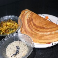 A picture of Sooji and chickpea batter dosa.