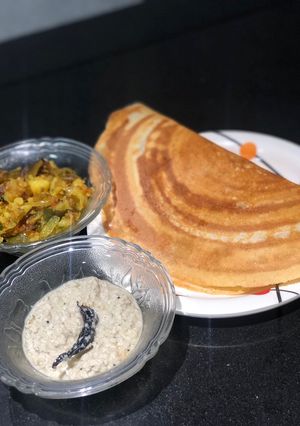 A picture of Sooji and chickpea batter dosa.