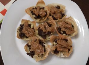 Una foto de Canastillas de morcilla y cebolla caramelizada con Thermomix