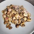 Champiñones guisados con tocino