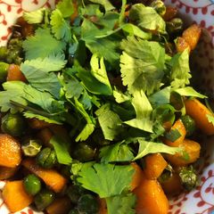A picture of Coriander carrots and peas - vegan.