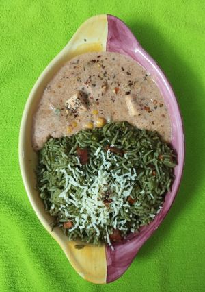 A picture of Green Rice with Paneer and Vegetables in Creamy Cheesy Ragi Sauce.