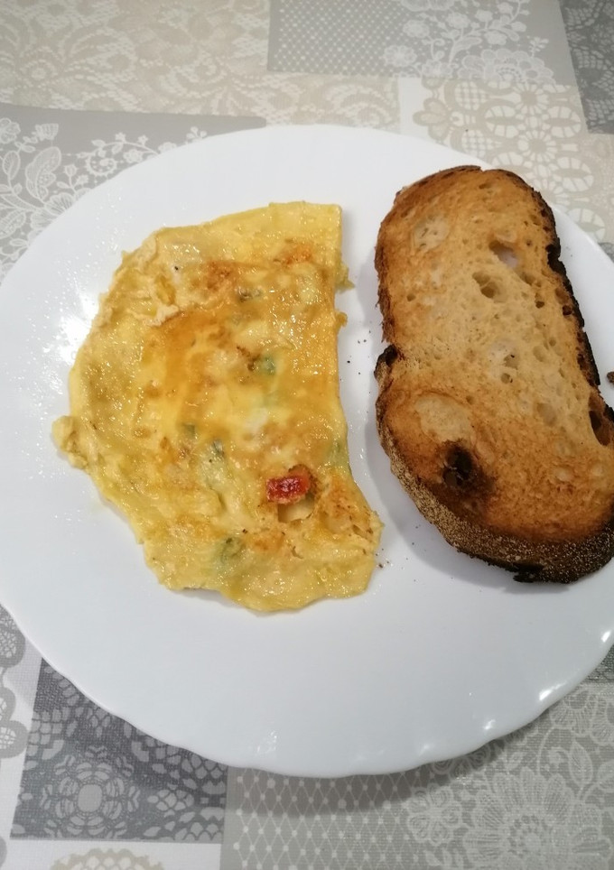 Una foto de 270. Tortilla a la francesa de esqueixada de bacallà