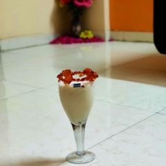 A picture of Banana Custard Apple Frappe with butterscotch ice cream.