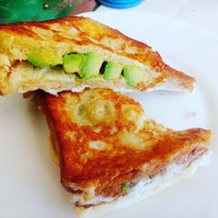 A picture of Avocado toast with eggs.