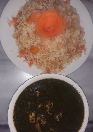 صورة لوصفة ملوخيه مع الارز بالشعيريه والجزر 😋