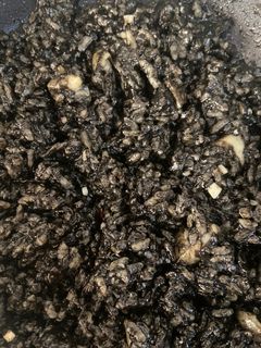 Una foto de Arroz negro con sepia